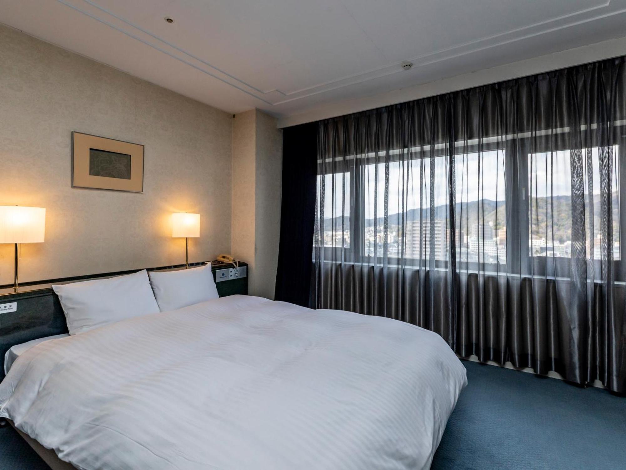 Century Plaza Hotel Tokushima Rom bilde